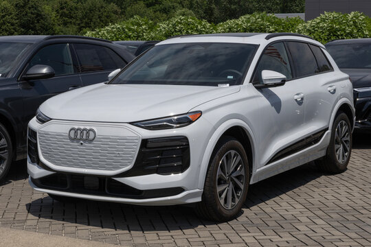 Audi Q6 e-tron quattro Premium electric SUV display. Audi offers the Q6 e-tron with up to 310 miles driving range. MY:2027
