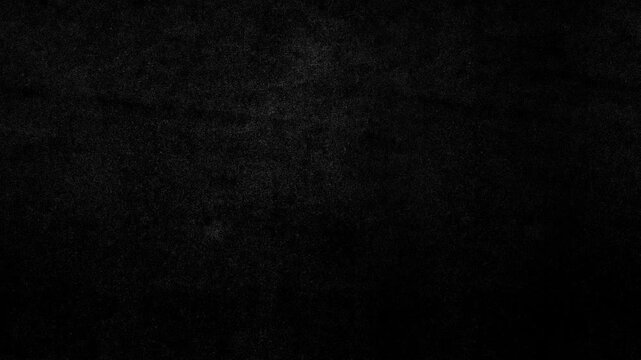 A gritty stop-motion seamless loop animation featuring textured black paper with grain, speckles, and analog imperfections. Minimal dark background for overlays, titles, and motion graphics