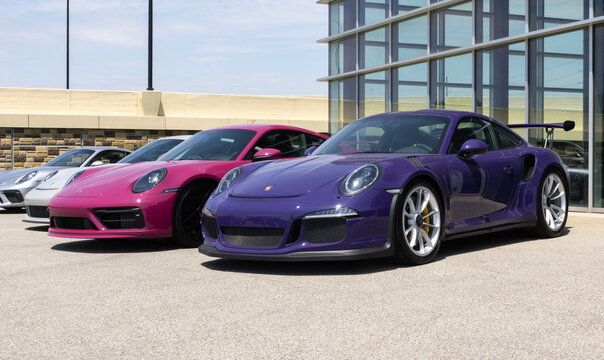 Used Porsche 911 GT3 RS MY:2016 and 911 Carrera 4 GTS MY:2024 display. Preowned Porsche sportscars are in high demand.
