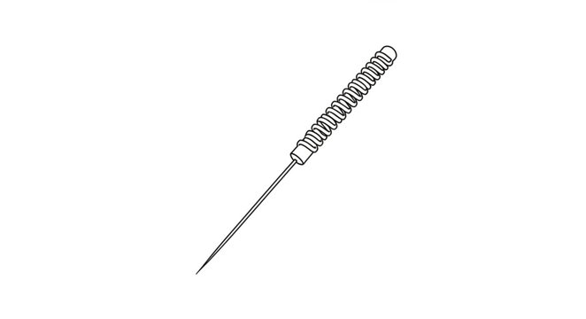 A coiled spring screwdriver lies on a surface indoors
