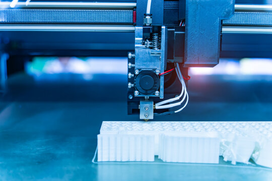 3D printer or additive manufacturing and robotic automation technology.