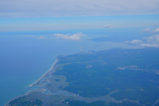 This aerial image shows the coastline of Scituate, Massachusetts, looking north along the South Shore.