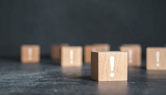 Exclamation Mark Wooden Cubes on Dark Surface