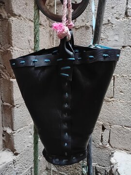 Traditional Moroccan leather water bucket well Erfoud