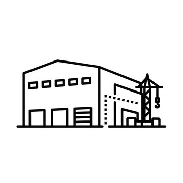 Industrial building with crane and warehouse loading dock area