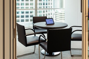 Modern office meeting room with small table and  City View  © Francisco