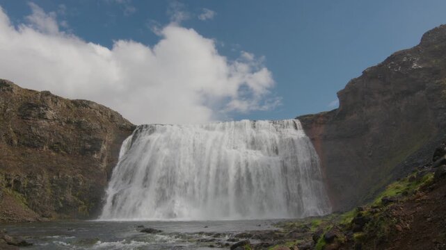 Scenic waterfall in summer Iceland sunny day
