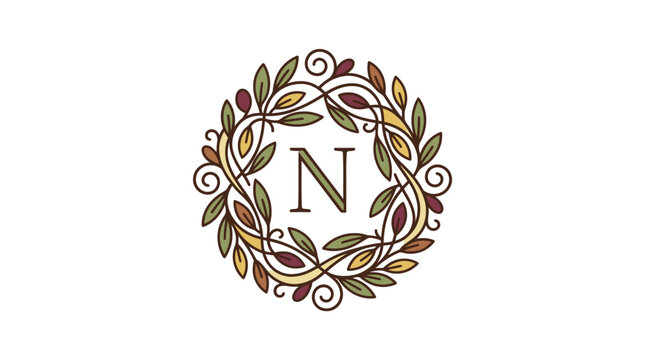 Decorative floral monogram initial n with autumn colored leaves in a circular wreath design on white background