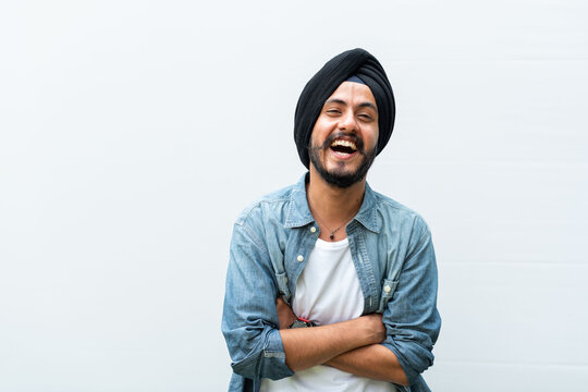 Joyful man in denim shirt