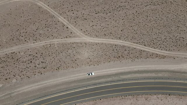 Atacama Desert, Chile. Car on the road. Aerial view by drone.