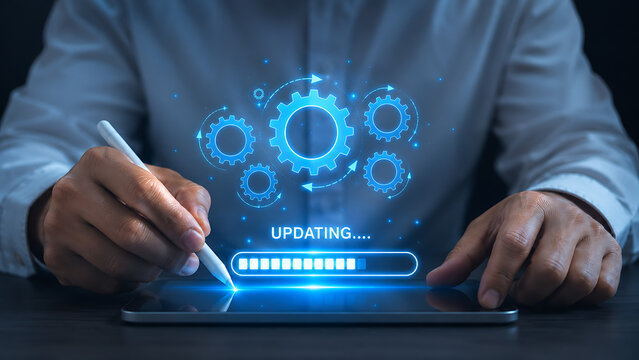 Business people are using a tablet to update new software systems, technology update concept.