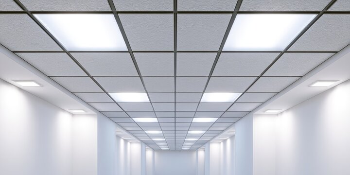 A long, illuminated hallway with a modern grid ceiling