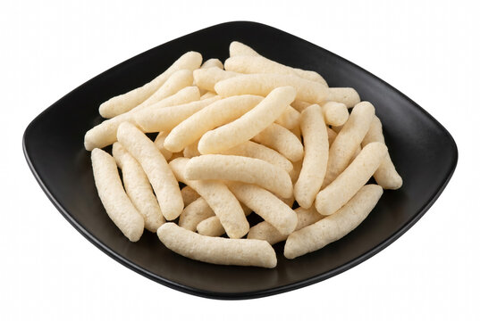 Crunchy White Puffed Corn Sticks Pile on a Dark Ceramic Plate
