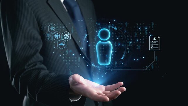 A businessman showcases a glowing digital icon representing technology and innovation, emphasizing modern solutions in a professional setting. Ideal for business themes. Qubit