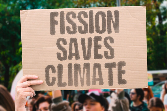 "Fission saves climate" Nuclear power reduces carbon emissions. NUCLEAR. ENERGY. FISSION. CLIMATE. CARBON.