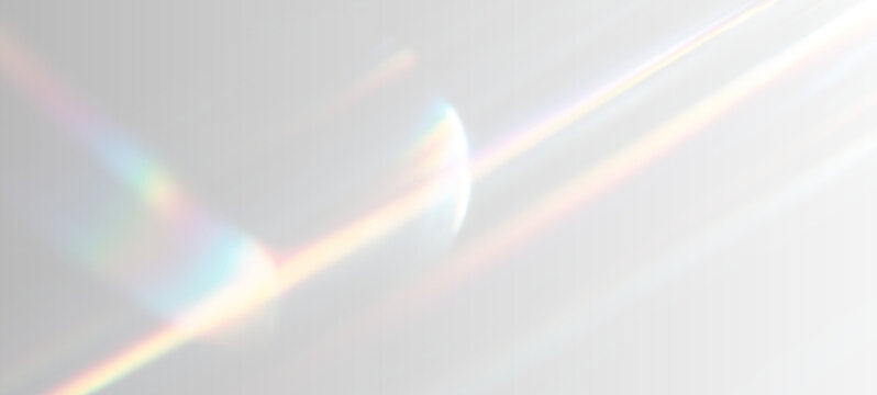 Glowing holographic rainbow light leak effect overlay. Soft prism refraction with colorful gradient shimmer. Abstract crystal glow for modern design.