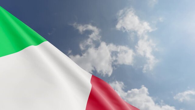 Passenger Airplane Flying Over Italian Flag Waving Against Blue Sky and Clouds Background