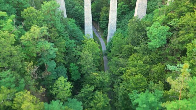 Discover the Zampach railway bridge, the tallest stone bridge in Czechia. Witness its impressive architecture and scenic surroundings while learning about its historical significance.