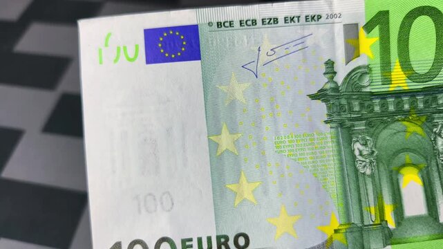 Explore the detailed features of a 100 euro banknote, highlighting its unique designs, colors, and security elements. Learn about its significance in Europe