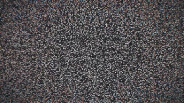 Abstract digital glitch distortion noise with vivid colors in a visual display