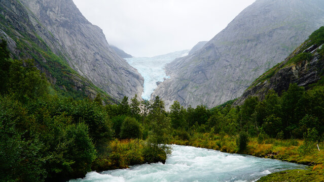 Green Misty Mountain and Glacier landscapes near Briksdal Glacier in Norway