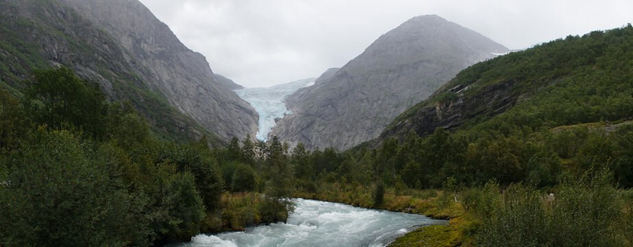 Green Misty Mountain and Glacier landscapes near Briksdal Glacier in Norway