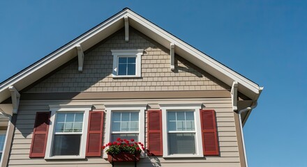 Obraz premium House with red shutters and flower box under window