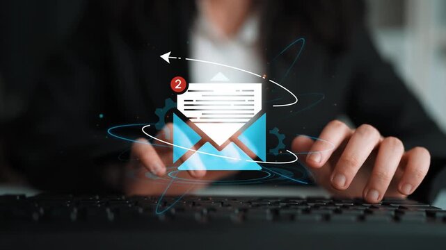 Professional Business Person Checking Emails on a Modern Computer with Notification Icons and Digital Elements in the Office Setting. Entropy.