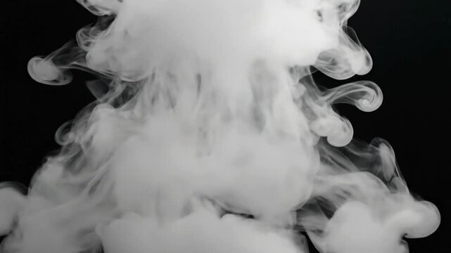 White smoke rises and swirls on black background in slow motion over a quiet environment at dusk captured with VSRExport technology