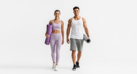 Fototapeta premium Happy Couple Walking With Yoga Mats On White Background