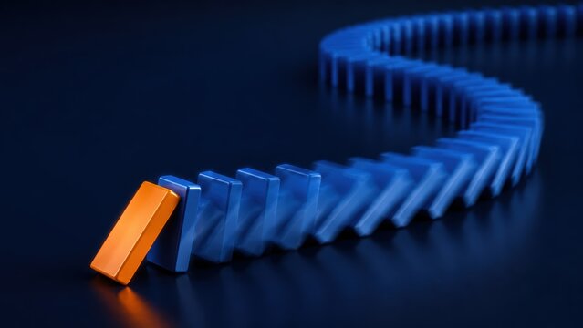 single orange domino falling into a line of blue dominoes on dark background, representing chain reaction, domino effect, business impact, leadership, risk, strategy and cause and effect concept