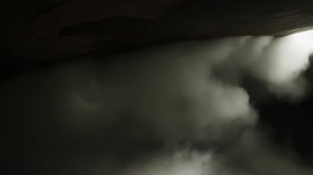 Dramatic view of rolling clouds on stormy day captured in timelapse sequence