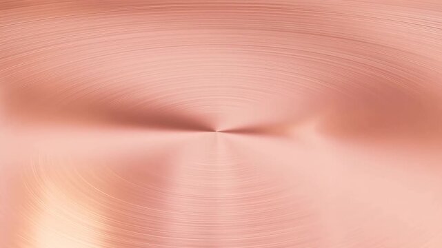 Slow motion rotating close up of brushed rose gold metal surface with moving light reflections in studio setting