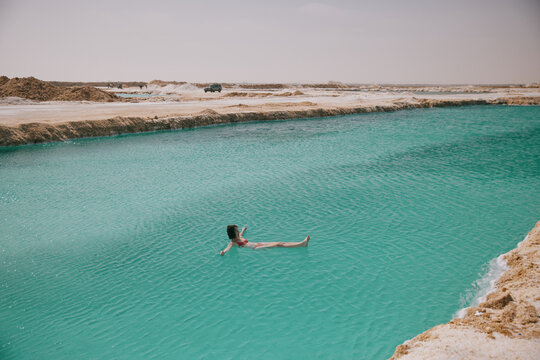 Floating in the warm waters of a salt spring in Egypt