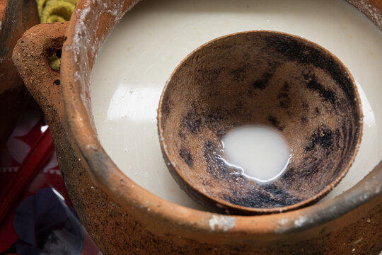 Clay Pot with corn atole Inside