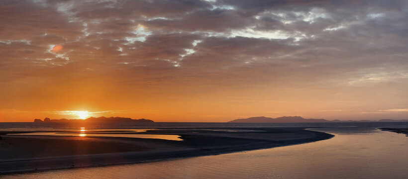 Stunning sunset over river panoramic view