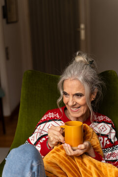 Elderly Woman tea While Sitting home 