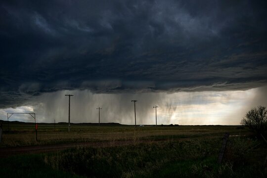 Thunder clouds loom over an Abandoned Softball Field