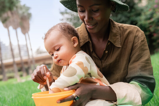 Mom picnicking with her baby 