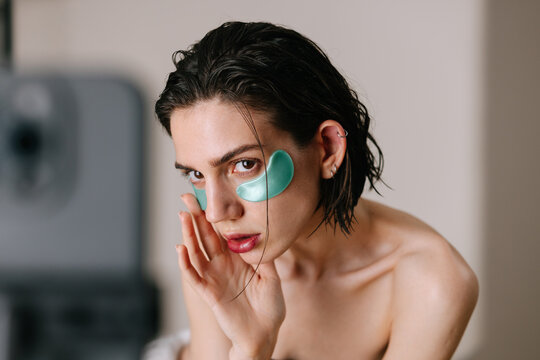 Woman with eye patches 