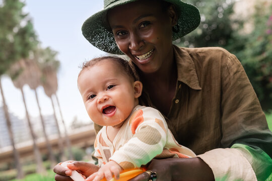 Portrait of happy mother and laughing baby 
