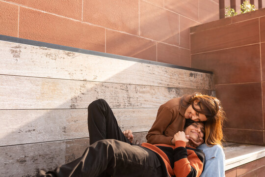 Lesbian Couple Enjoys Time Together on a Bench 