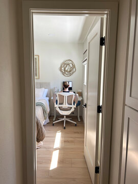 Back View of Woman Working In Home Office