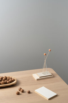 Minimal Still Life with Vase and Walnuts