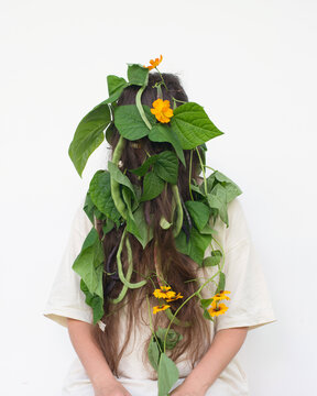 Hidden woman portrait  with bean leaves 4