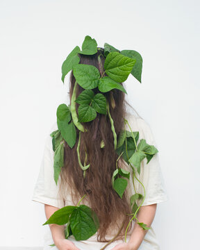 Hidden woman portrait  with bean leaves 9