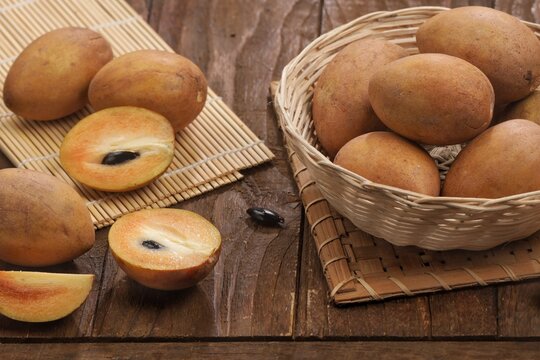 buah Sawo. Manila sapodilla (Manilkara zapota) is a fruit tree that can bear fruit all year round