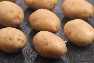 Fototapeta premium Potato. Natural organic root vegetables with brown skin and nutritious flesh, commonly used in a wide variety of culinary dishes around the world.