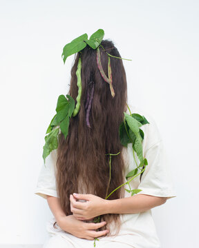 Hidden woman portrait  with bean leaves 7