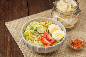 Soto ayam is a typical Indonesian food in the form of a type of chicken soup with a yellowish sauce. This yellow color is due to turmeric which is used as a spice © Noor
